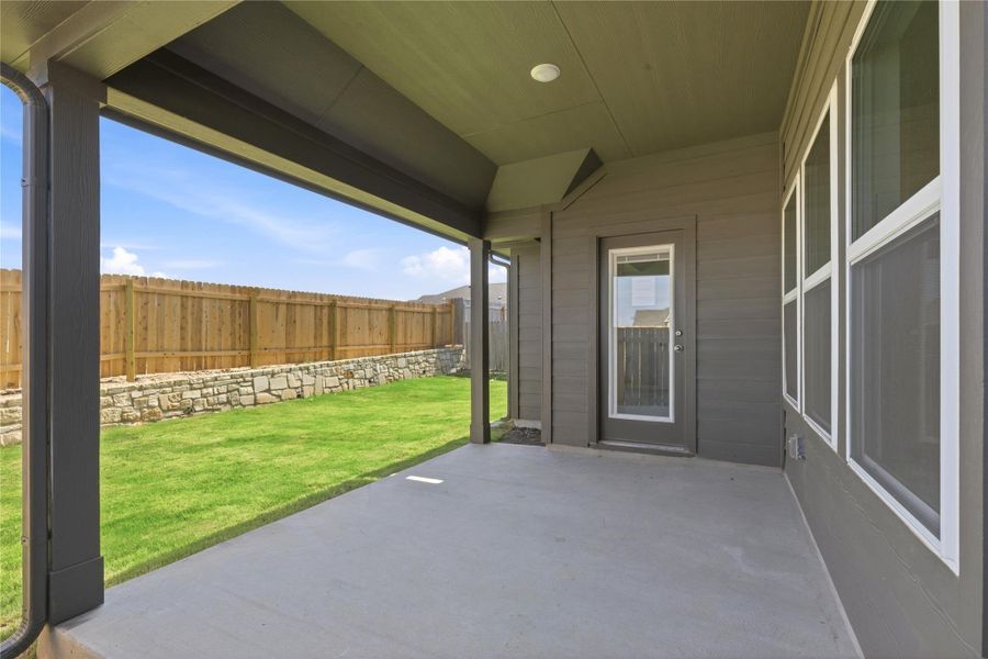 Exterior details and patio area of a home in Hunters Glen, Jarrell (Image 4).