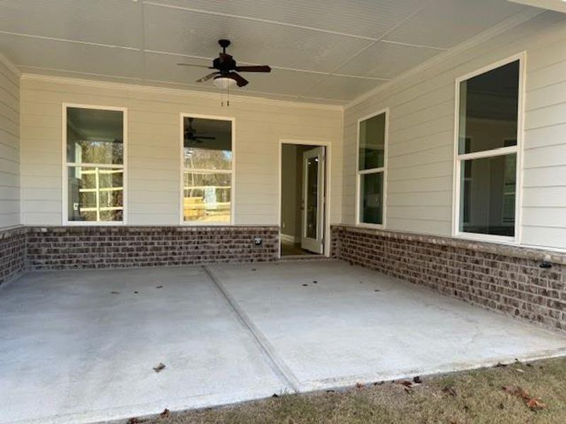 Exterior details and patio area of a home in Cooper's Walk, Loganville (Image 3).