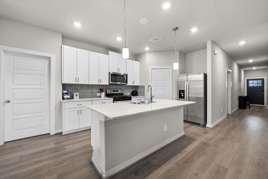 Furnished interior view inside a new home in Heights of Barbers Hill, Mont Belvieu (Image 11).