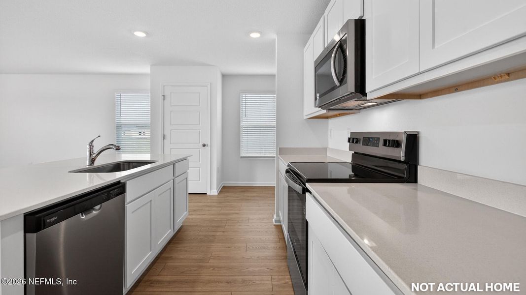 Furnished interior view inside a new home in Rookery, Green Cove Springs (Image 4).
