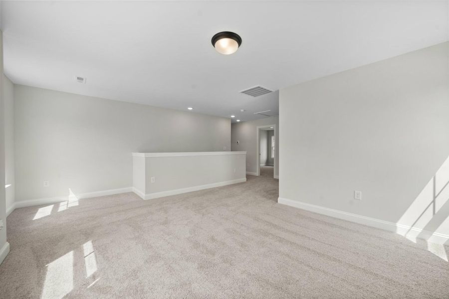Spacious, unfurnished interior of a new home in Cottages at Piper Village, Trinity (Image 27).