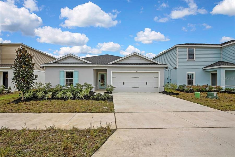 Front exterior of a new home in , Sumterville, FL, highlighting curb appeal (Image 30).