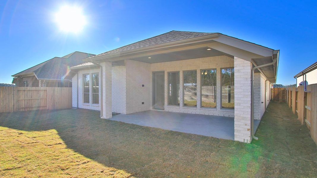 Exterior details and patio area of a home in Artavia, Conroe (Image 3).
