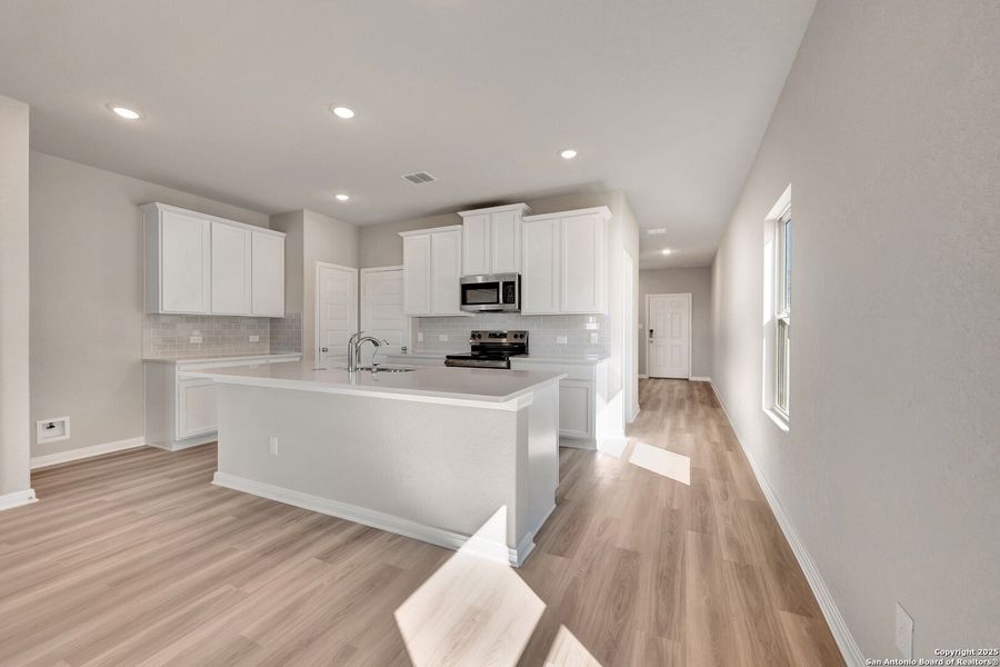 Furnished interior view inside a new home in Paloma Park, Converse (Image 7).