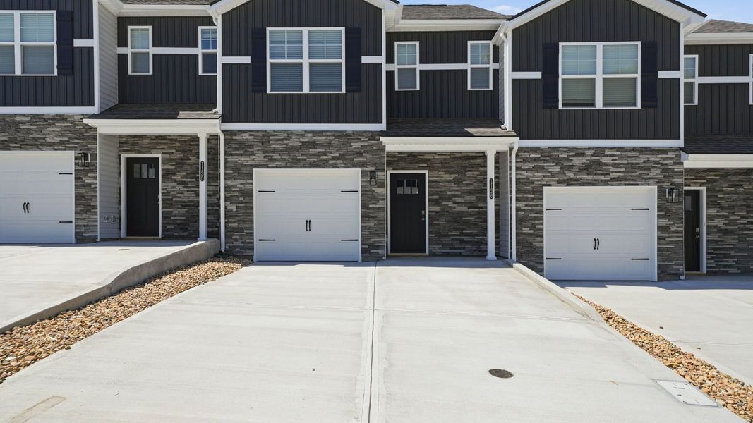 Front exterior of a new home in The Arbor Townhomes, Kingsport, TN, highlighting curb appeal (Image 2).