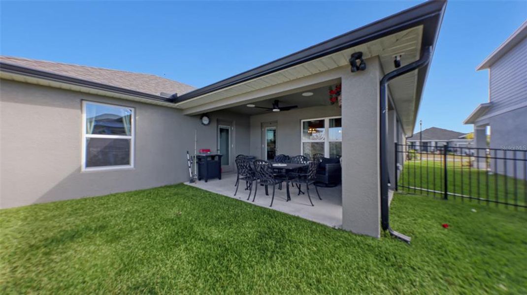 Exterior details and patio area of a home in Aviary at Rutland Ranch, Parrish (Image 21).