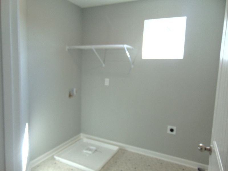 The family laundry room with natural lighting to brighten up your space.