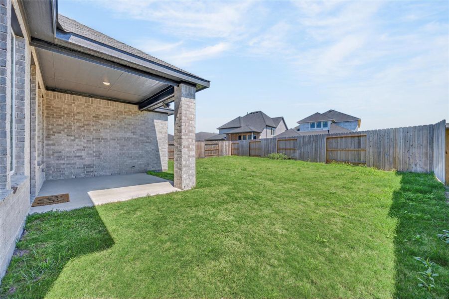 Exterior details and patio area of a home in Trillium, Richmond (Image 28).