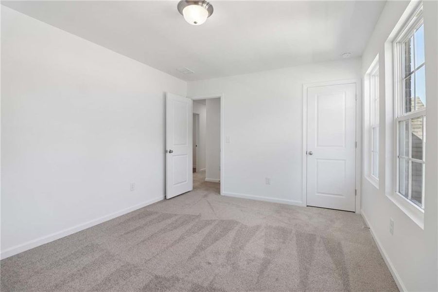 Spacious, unfurnished interior of a new home in The Pointe at Heron Bay, Locust Grove (Image 29).