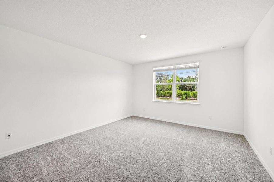 Spacious, unfurnished interior of a new home in Hampton Park - Classic Series, Vero Beach (Image 19).