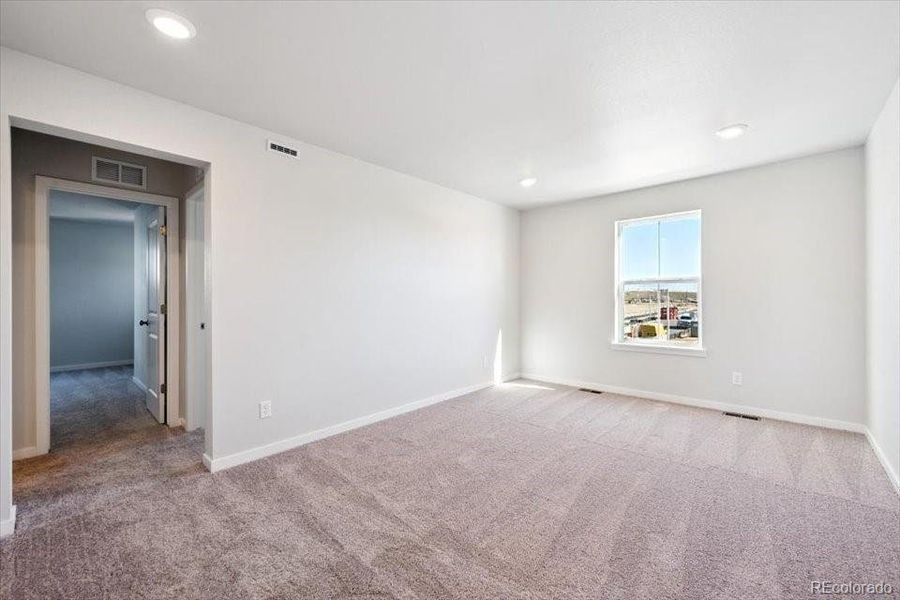 Spacious, unfurnished interior of a new home in The Boulevard II Collection at Windler, Aurora (Image 20).