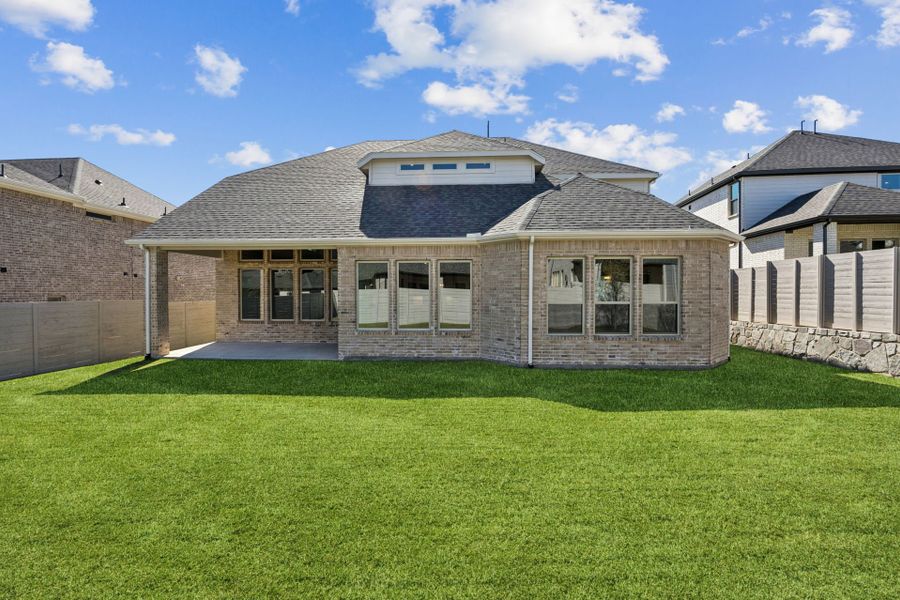 Exterior details and patio area of a home in Painted Tree Lakeside, McKinney (Image 25).