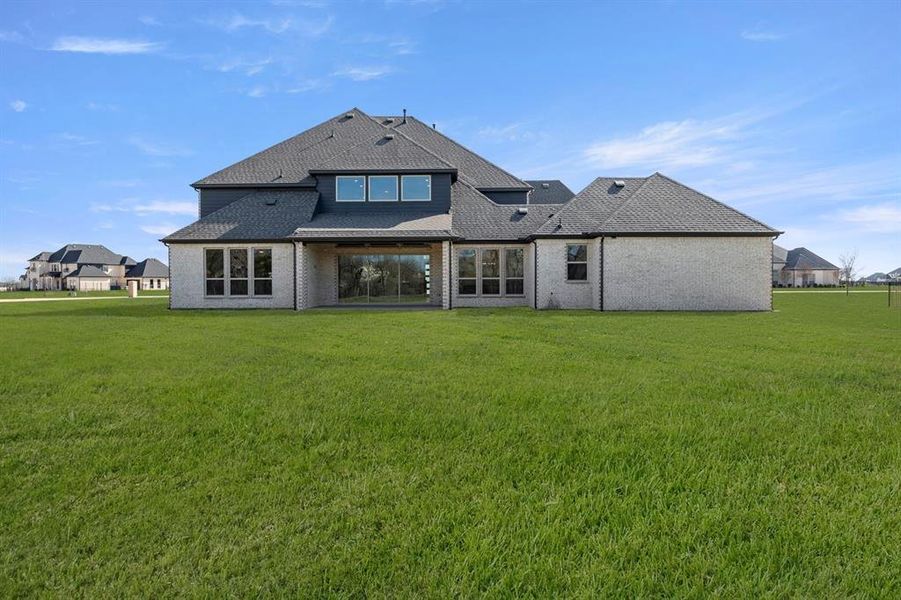 Exterior details and patio area of a home in Parker Ranch, Parker (Image 4).