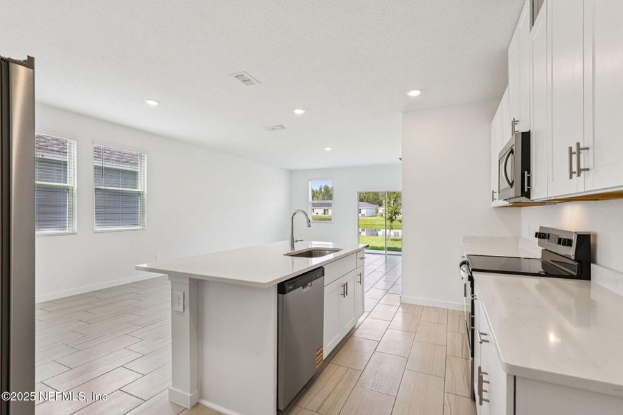 Furnished interior view inside a new home in Cypress Meadows - Classic Series, Jacksonville (Image 4).