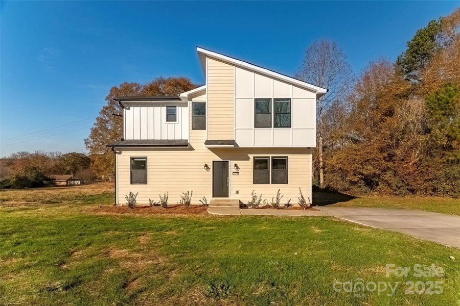 Front exterior of a new home in , Shelby, NC, highlighting curb appeal (Image 1).