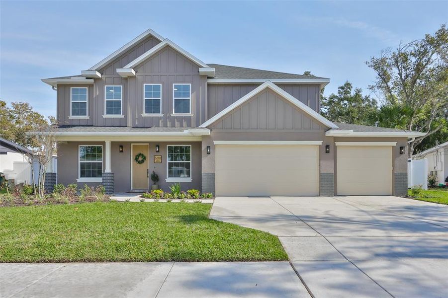 Front exterior of a new home in , Tampa, FL, highlighting curb appeal (Image 1). Front exterior of a new home in , Tampa, FL, highlighting curb appeal (Image 1).