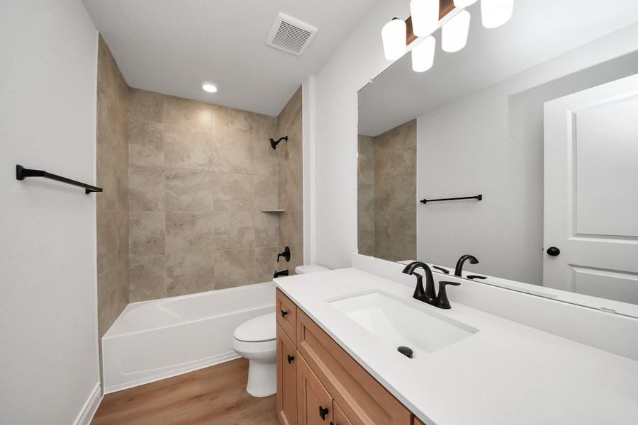 Furnished interior view inside a new home in Lexington Heights, Willis (Image 9).