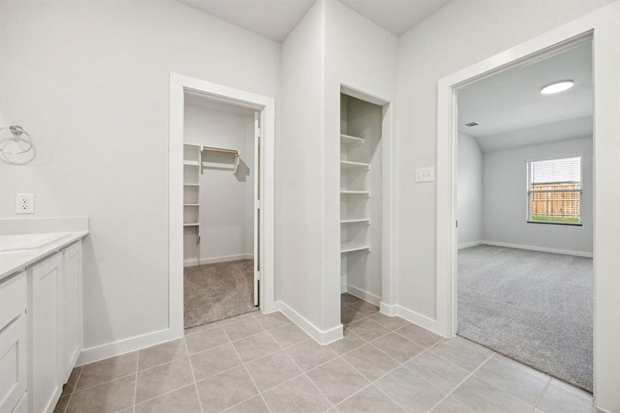 Primary Bathroom in the Emmy II home plan by Trophy Signature Homes - REPRESENTATIVE PHOTO