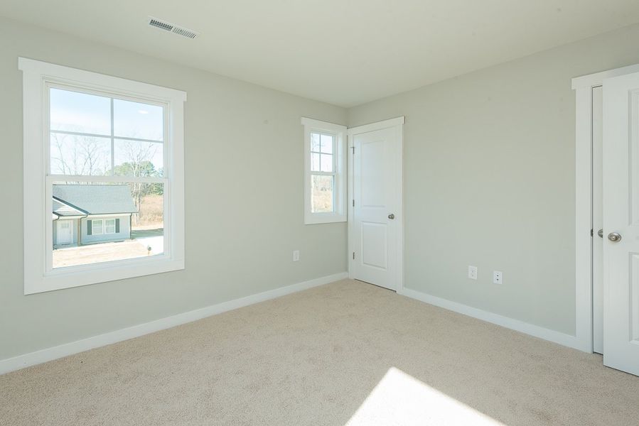 Representative unfurnished interior of a home built from the Marshall by Foundation Home Builders LLC in Pinnix Loop, Burlington (Image 21).