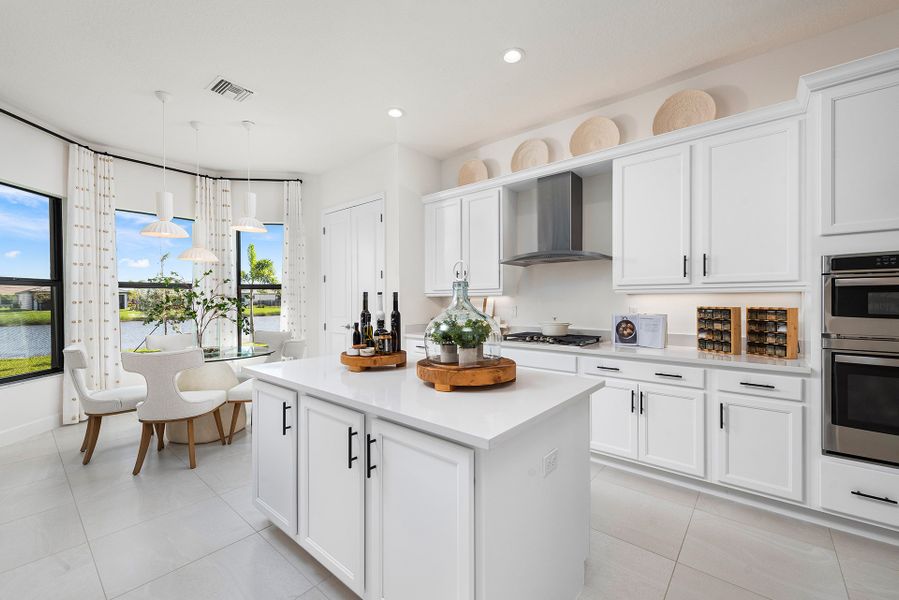 Representative furnished interior of a home built from the Carlyle by GL Homes in Valencia Parc at Riverland, Port St. Lucie (Image 6).
