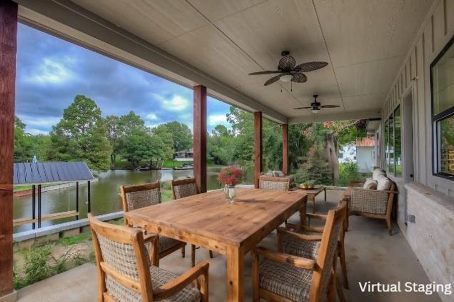 View of patio / terrace featuring a water view, ceiling fan, and an outdoor hangout area