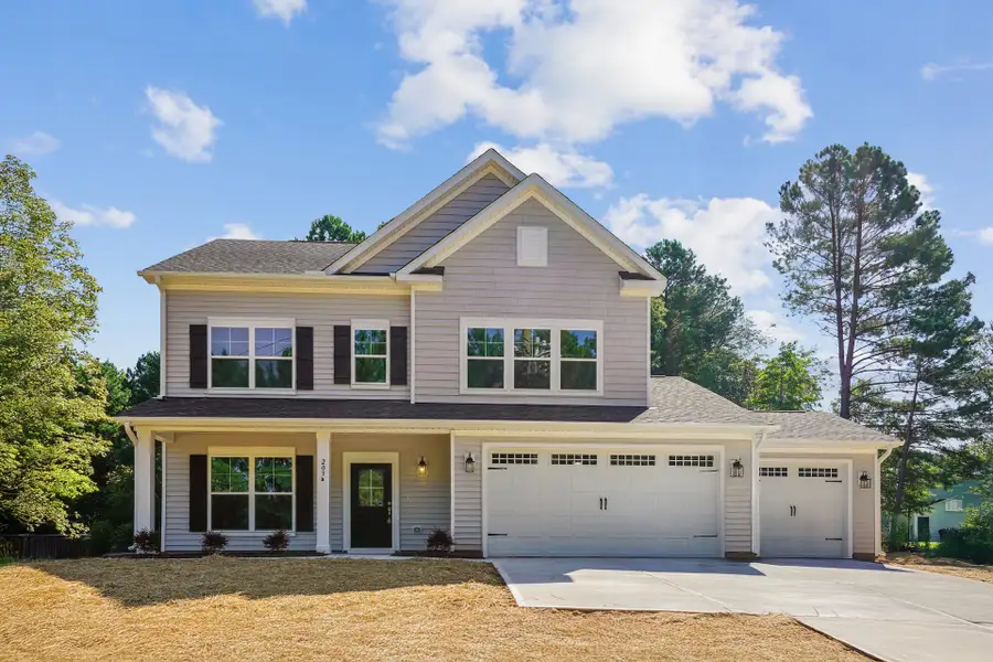 Representative exterior photo of a completed home built from the Badin by Caruso Homes in Blue Run, Raleigh, NC (Image 30). Representative exterior photo of a completed home built from the Badin by Caruso Homes in Blue Run, Raleigh, NC (Image 30).