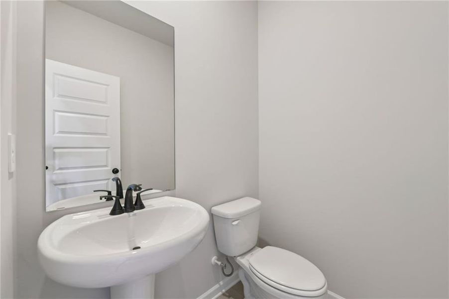 Furnished interior view inside a new home in Vines at Mill Creek - Estate Series, Braselton (Image 6). Furnished interior view inside a new home in Vines at Mill Creek - Estate Series, Braselton (Image 6).