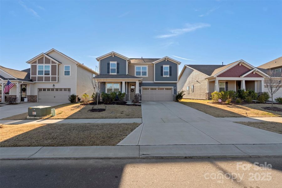Front exterior of a new home in Waxhaw Landing, Monroe, NC, highlighting curb appeal (Image 22).