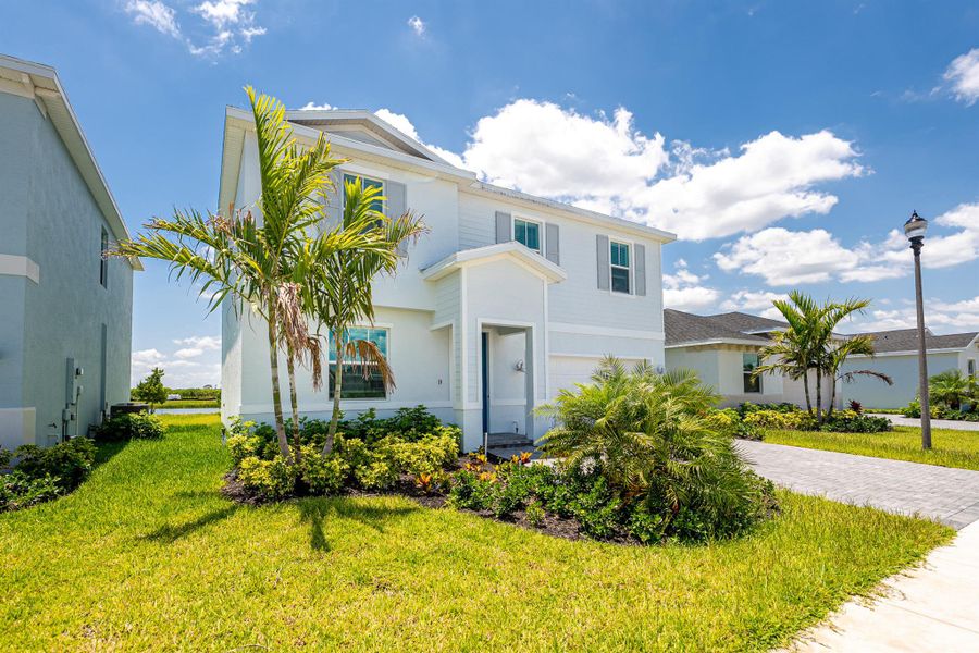 Front exterior of a new home in , Fort Pierce, FL, highlighting curb appeal (Image 17). Front exterior of a new home in , Fort Pierce, FL, highlighting curb appeal (Image 17).