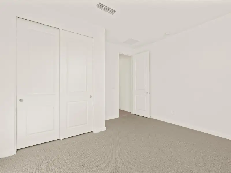 Spacious, unfurnished interior of a new home in Mesquite Mountain Ranch at Frontera, Surprise (Image 19).