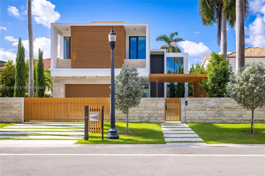 Front exterior of a new home in , Miami Beach, FL, highlighting curb appeal (Image 2). Front exterior of a new home in , Miami Beach, FL, highlighting curb appeal (Image 2).