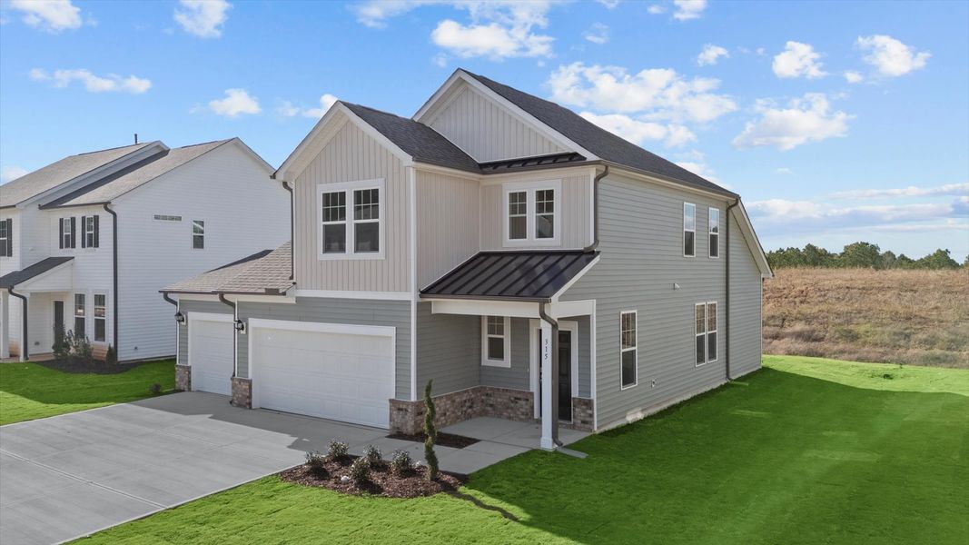 Representative exterior photo of a completed home built from the Freesia by DRB Homes in Essex Village, Franklinton, NC (Image 25).