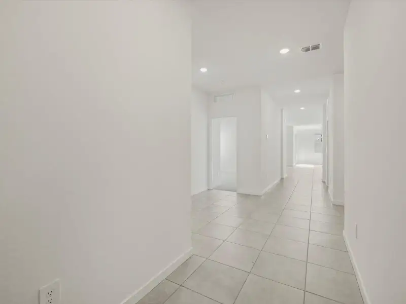 Spacious, unfurnished interior of a new home in Entrada Estate Series, Tolleson (Image 15).