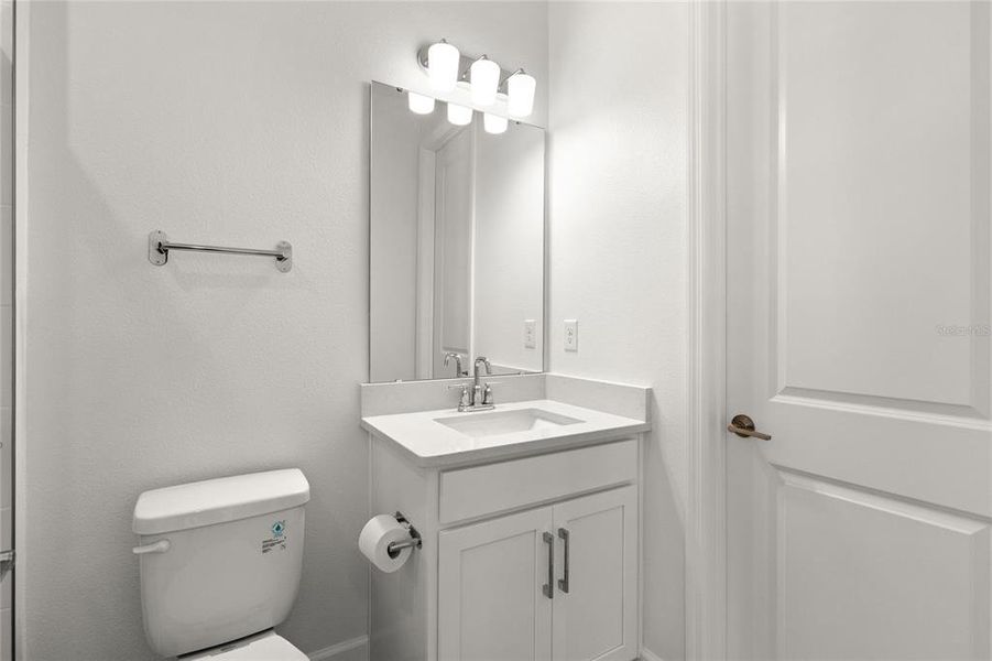 Furnished interior view inside a new home in Harvest at Ovation, Winter Garden (Image 13).