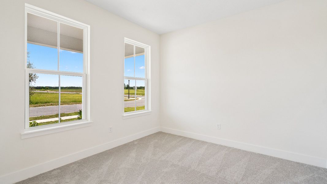The Sweetgum front room flex space on left of entry two story home in Trailside in Mount Dora by DRB Homes