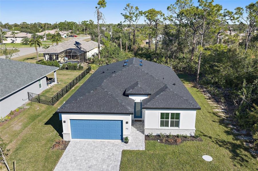Front exterior of a new home in , Rotonda West, FL, highlighting curb appeal (Image 23). Front exterior of a new home in , Rotonda West, FL, highlighting curb appeal (Image 23).