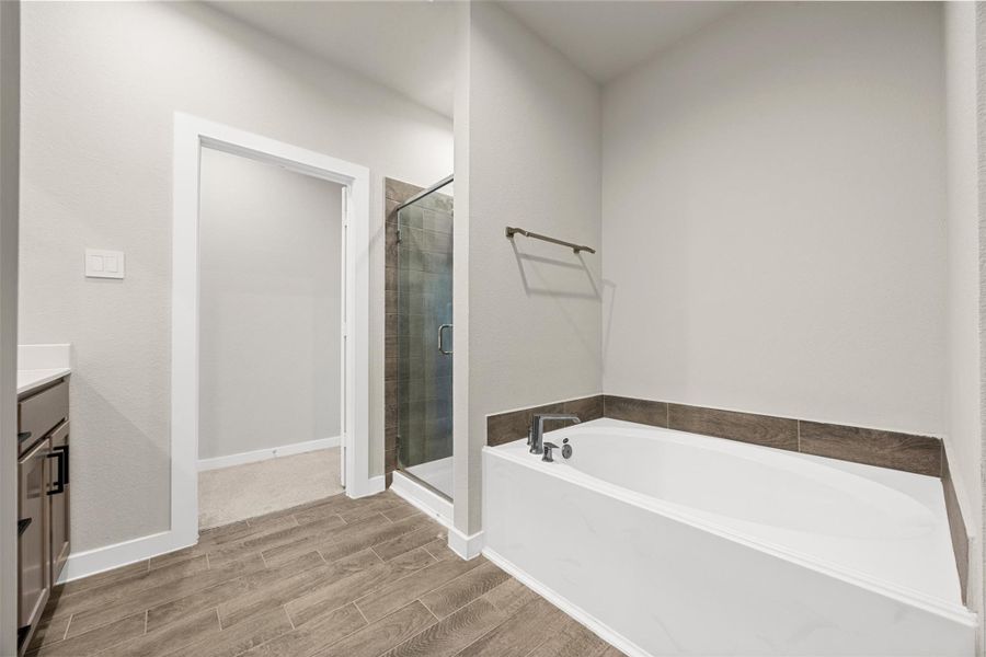 Furnished interior view inside a new home in Sunterra, Katy (Image 17).