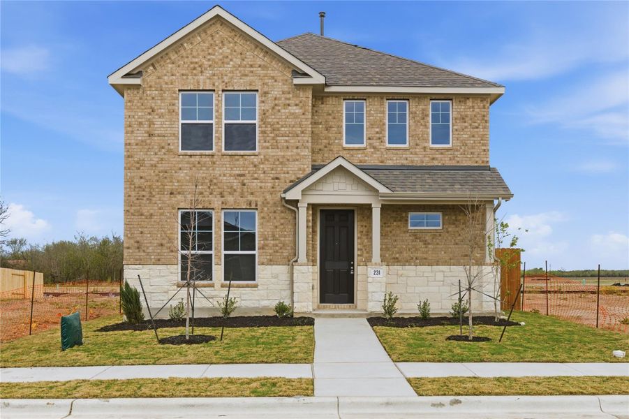 Front exterior of a new home in Infinity Square, Kyle, TX, highlighting curb appeal (Image 19).