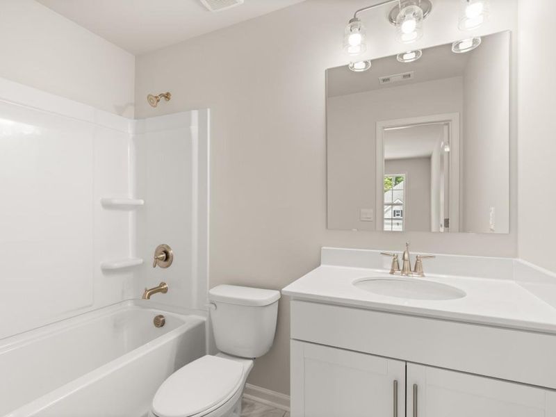 Furnished interior view inside a new home in Butner Estates, College Park (Image 12).