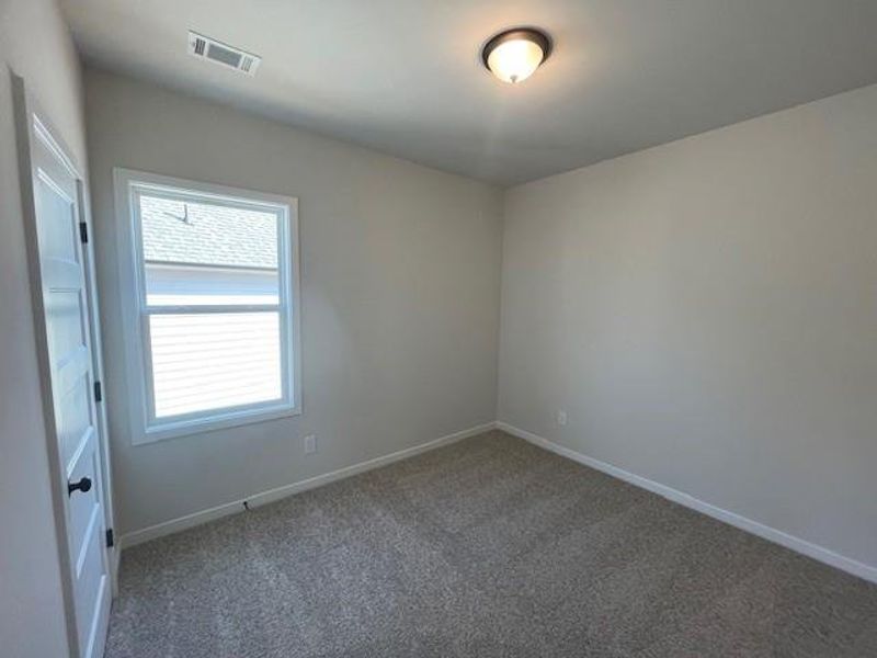 Spacious, unfurnished interior of a new home in Ponderosa Farms Estates, Gainesville (Image 28).