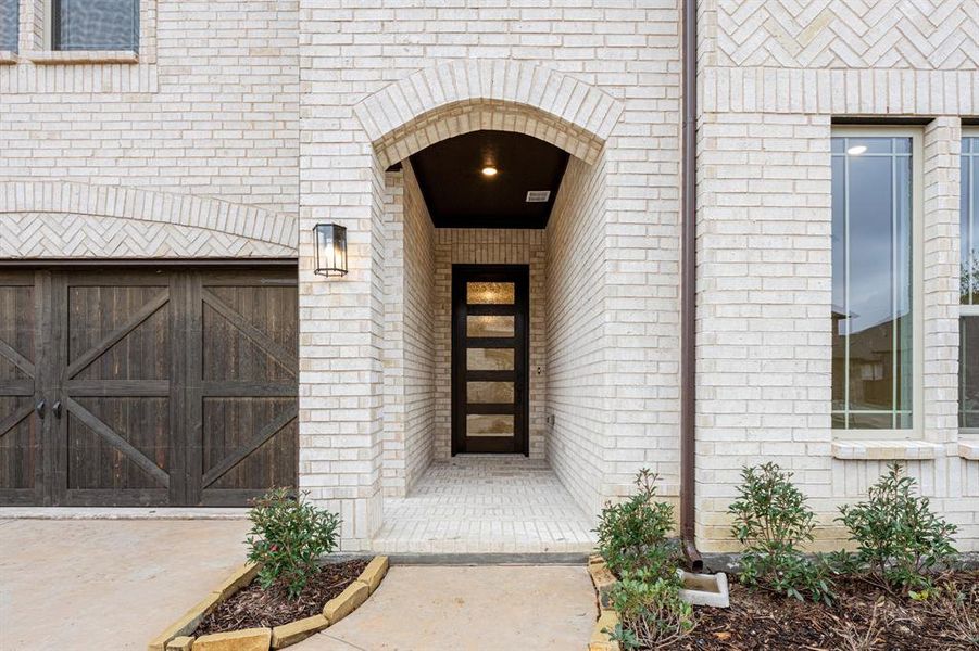 Exterior details and patio area of a home in Windsong Ranch Classic 61, Prosper (Image 24).