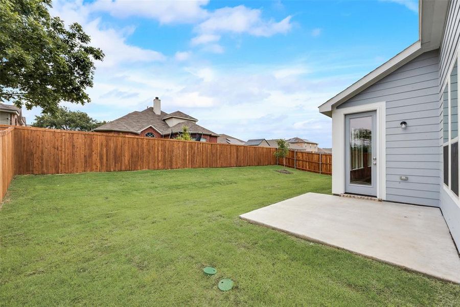 Front exterior of a new home in Creekside of Crowley, Crowley, TX, highlighting curb appeal (Image 16).