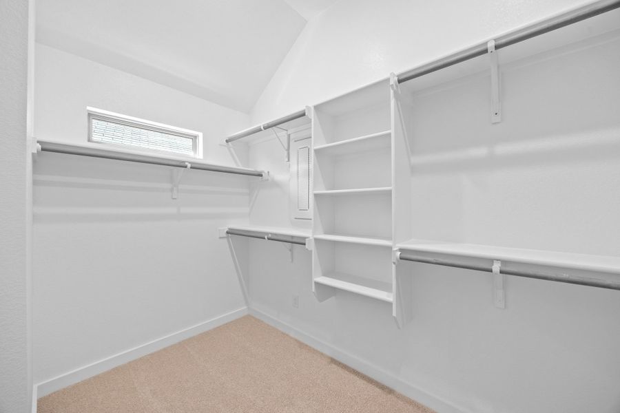 Primary Closet in the Quartz home plan by Trophy Signature Homes – REPRESENTATIVE PHOTO