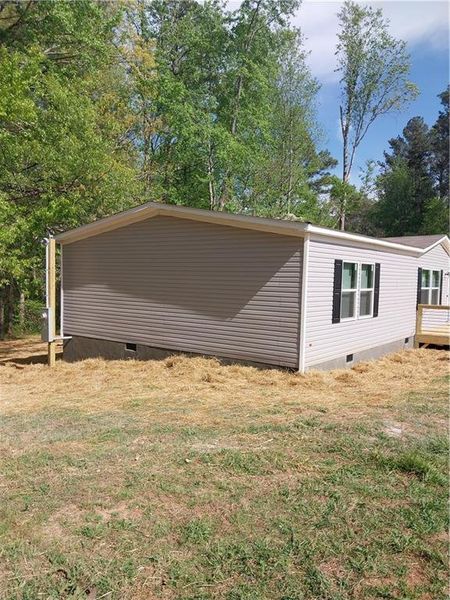 Exterior details and patio area of a home in , Dawsonville (Image 9).