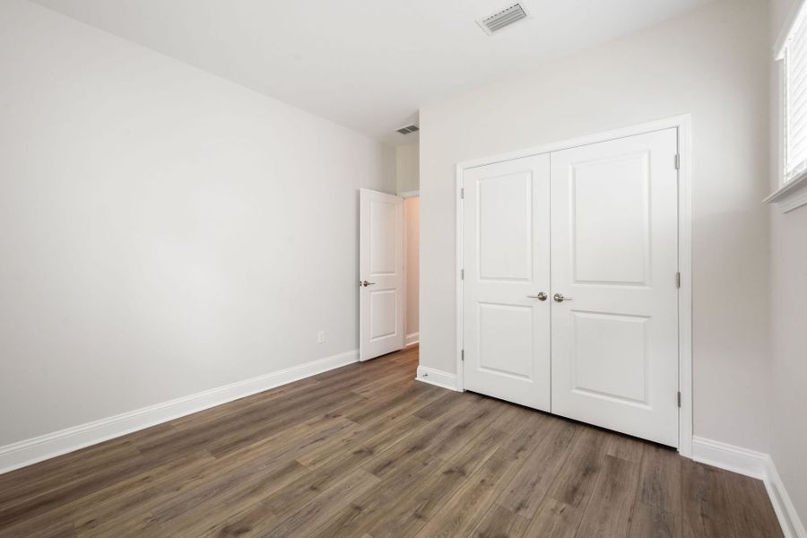 Spacious, unfurnished interior of a new home in Waterways, Richmond Hill (Image 57).