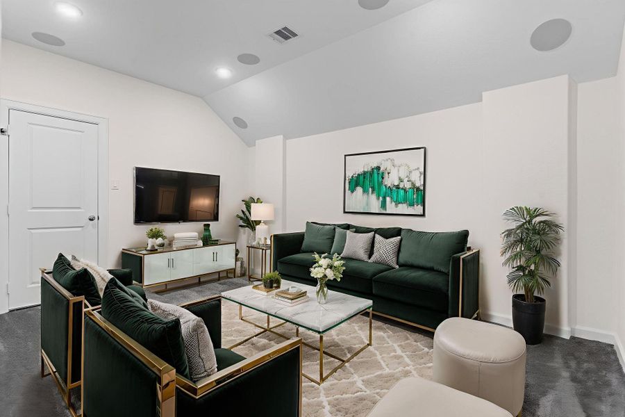 Photo is Virtually Staged — Spacious upstairs media room designed for entertaining, featuring flexible space for a theater setup, gaming, or family movie nights, complete with cozy ambiance and room for large seating arrangements. Photo is Virtually Staged — Spacious upstairs media room designed for entertaining, featuring flexible space for a theater setup, gaming, or family movie nights, complete with cozy ambiance and room for large seating arrangements.