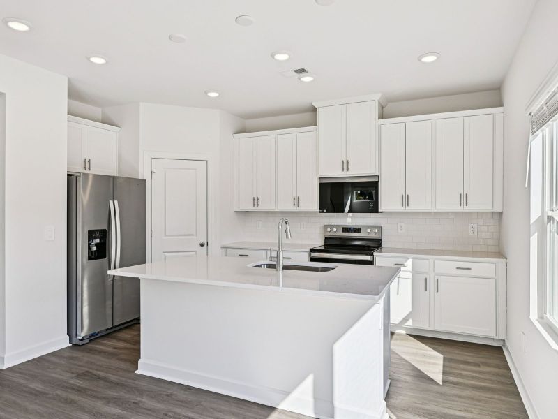 Furnished interior view inside a new home in Harper Landing, Stanley (Image 4).
