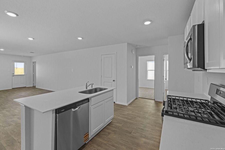Furnished interior view inside a new home in Hickory Ridge, Elmendorf (Image 11).