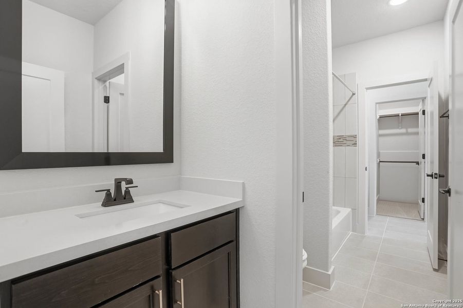 Furnished interior view inside a new home in Kinder Ranch 70's, San Antonio (Image 17).