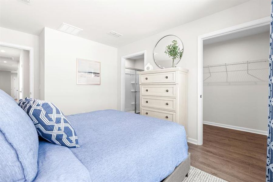Representative furnished interior of a home built from the Ellis by Ryan Homes in Middle Creek Village Coastal Cottages & Villas, Bolivia (Image 17).